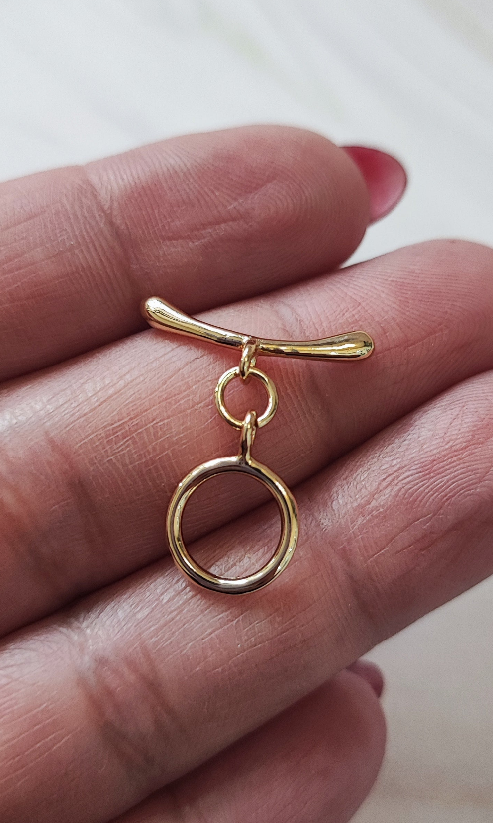BROCHE CON PALITO